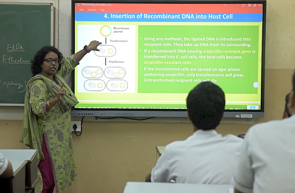Students using technology for interactive classroom learning